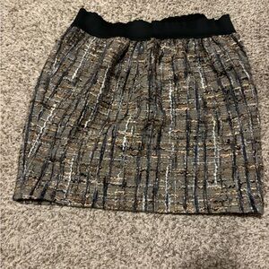 Dolce & Gabbana Tweed Pattern Mini Skirt
Women’s Size: XS | US2, IT38